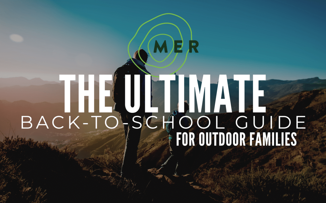 Dad and son hiking on a Colorado mountain trail during back-to-school season for outdoor families.